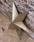 Luxury Tara Trio gold star wall art set, distressed vintage metal decor, celestial home accents, best-selling rustic elegance by Maravi at brixbailey.com