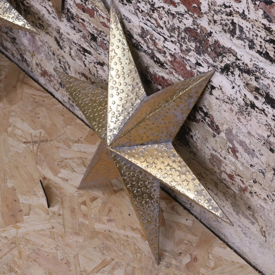 Luxury Tara Trio gold star wall art set, distressed vintage metal decor, celestial home accents, best-selling rustic elegance by Maravi at brixbailey.com