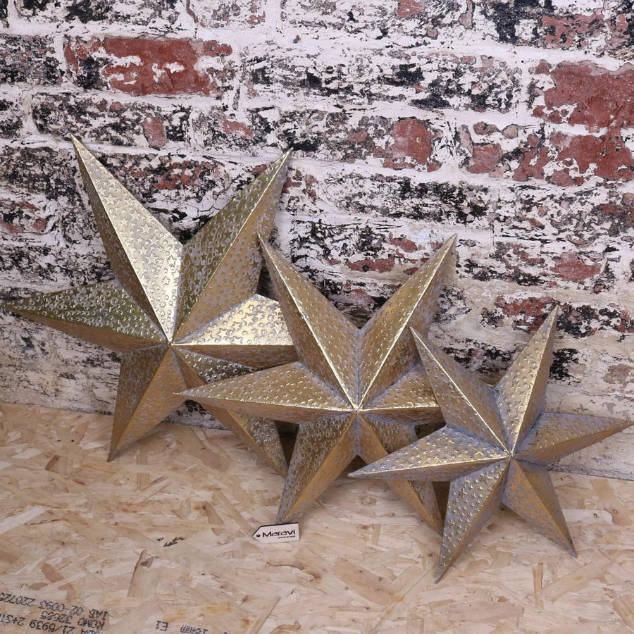 Luxury Tara Trio gold star wall art set, distressed vintage metal stars for home decor, celestial rustic elegance by Maravi at brixbailey.com