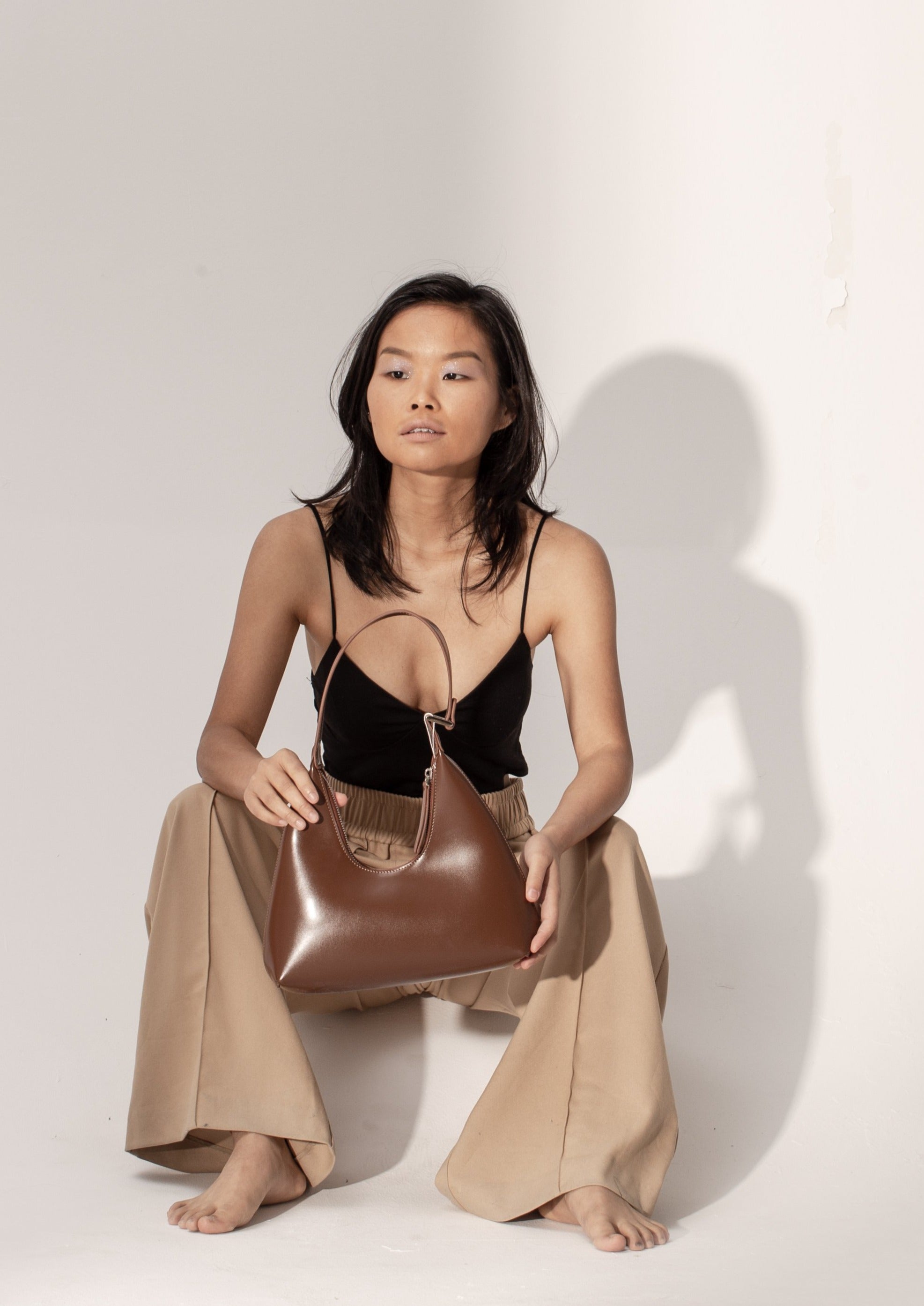 Luxury Alexia small hobo bag in smooth caramel leather, elegant and sophisticated, best-selling genuine leather handbag with silver hardware by Bob Oré at brixbailey.com
