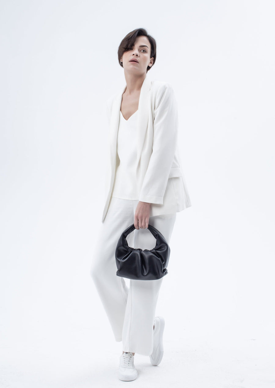 Luxury Marshmallow Croissant Bag, premium black leather evening handbag, stylish foldable clutch, trending statement piece by Bob Oré at brixbailey.com