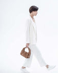 Luxury Marshmallow Croissant Bag, Premium Soft Leather Handbag in Caramel, Stylish Evening Purse, Trending Designer Shoulder Bag by Bob Oré at brixbailey.com