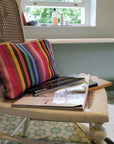 Premium large rainbow toiletry bag, luxury British woven organic cotton with waterproof lining, recycled yarns, durable zip, versatile for baby essentials or travel by Maison Elhoria at brixbailey.com