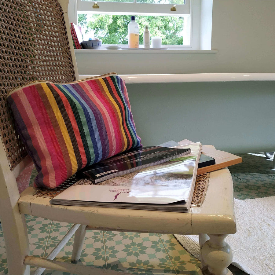 Premium large rainbow toiletry bag, luxury British woven organic cotton with waterproof lining, recycled yarns, durable zip, versatile for baby essentials or travel by Maison Elhoria at brixbailey.com