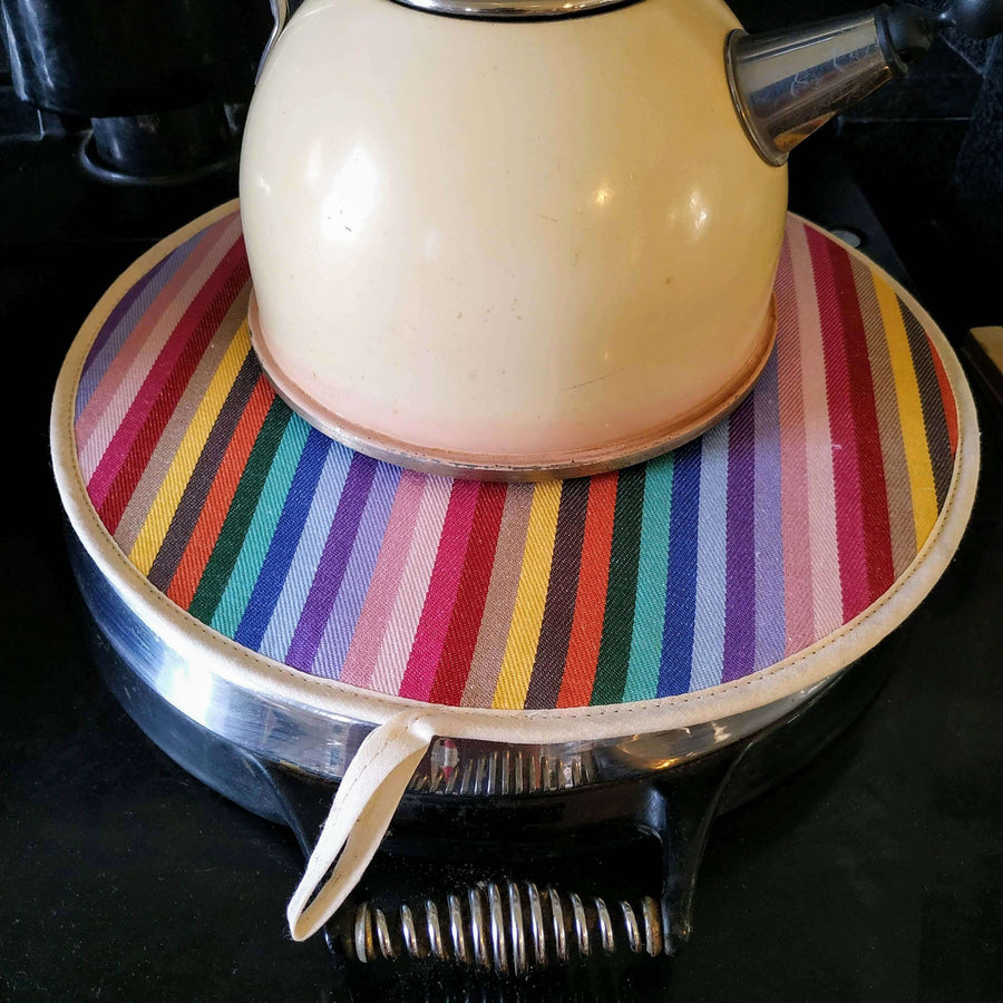 Luxury rainbow chef pad for Aga range cooker, premium heat-retaining hob cover, handcrafted from recycled organic cotton by Maison Elhoria at brixbailey.com