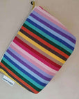 Premium large rainbow toiletry bag, versatile organic cotton waterproof travel pouch, British-made recycled yarn, stylish and practical by Maison Elhoria at brixbailey.com