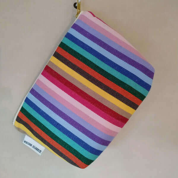 Premium large rainbow toiletry bag, versatile organic cotton waterproof travel pouch, British-made recycled yarn, stylish and practical by Maison Elhoria at brixbailey.com