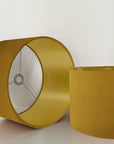Mustard velvet drum lampshade/ ceiling shade with a metallic brushed gold lining