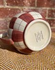 Checkered ceramic pitcher