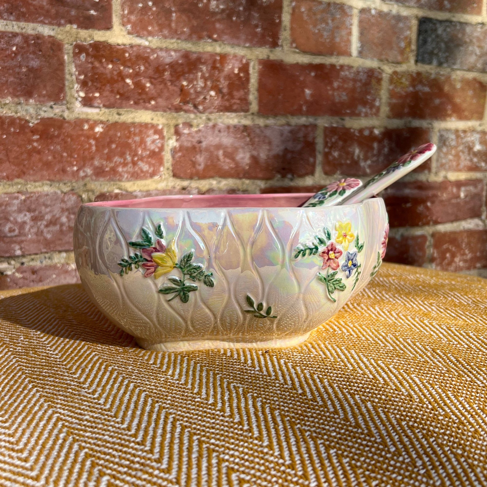Floral salad bowl, with serving utensils