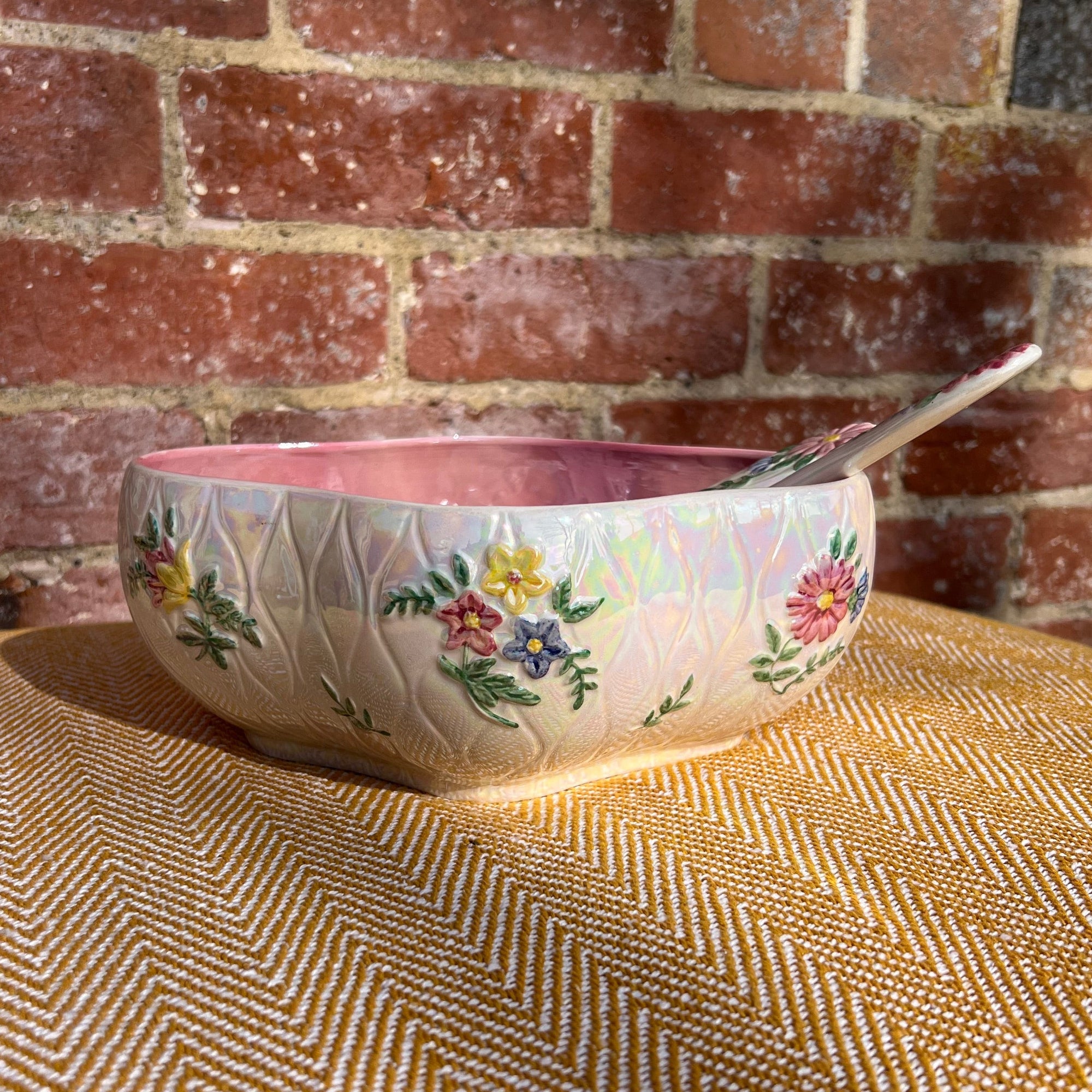 Floral salad bowl, with serving utensils