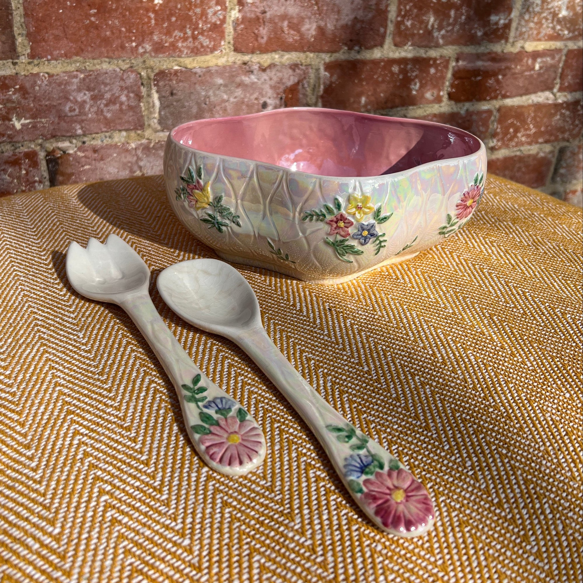Floral salad bowl, with serving utensils