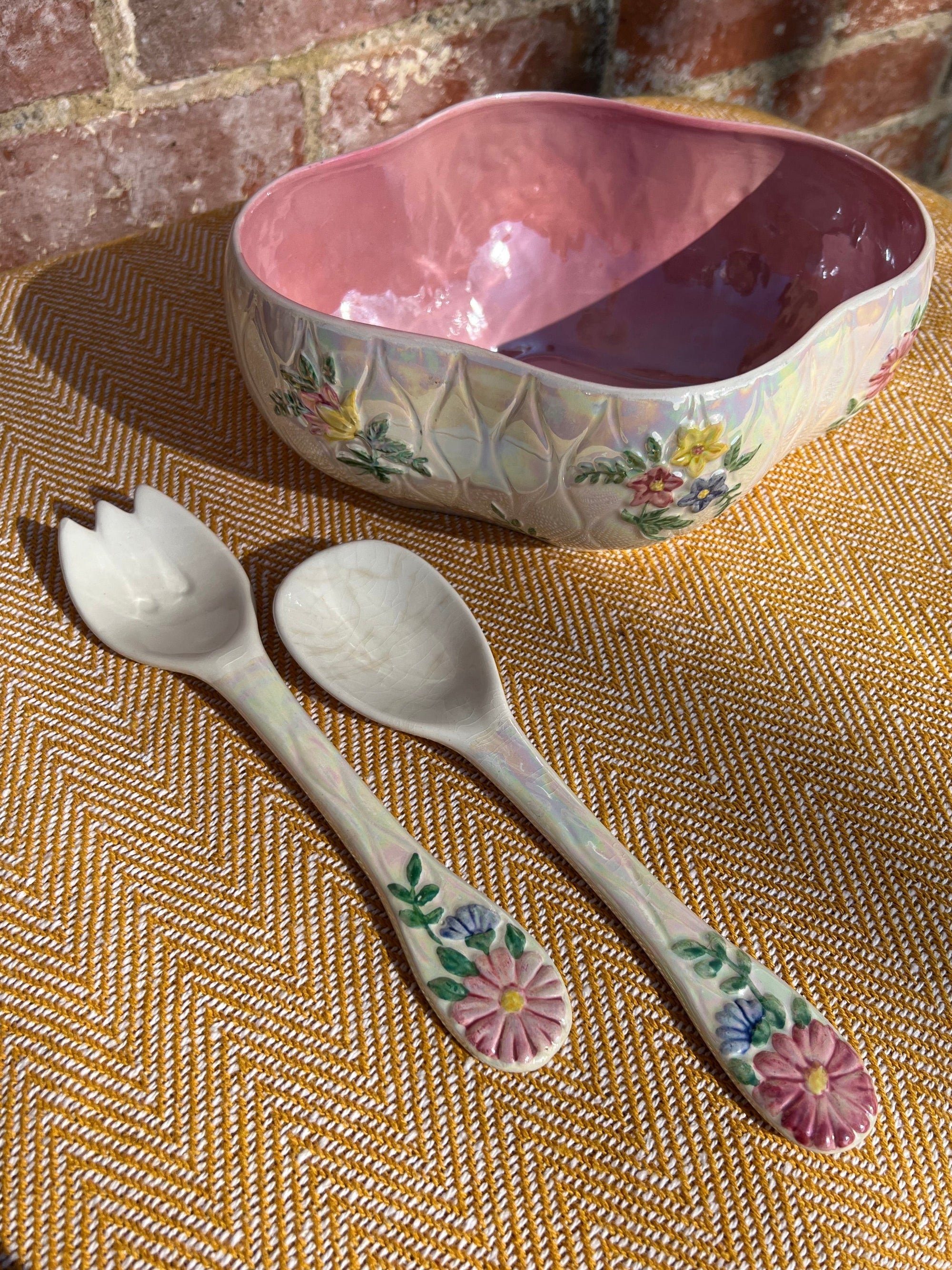 Floral salad bowl, with serving utensils