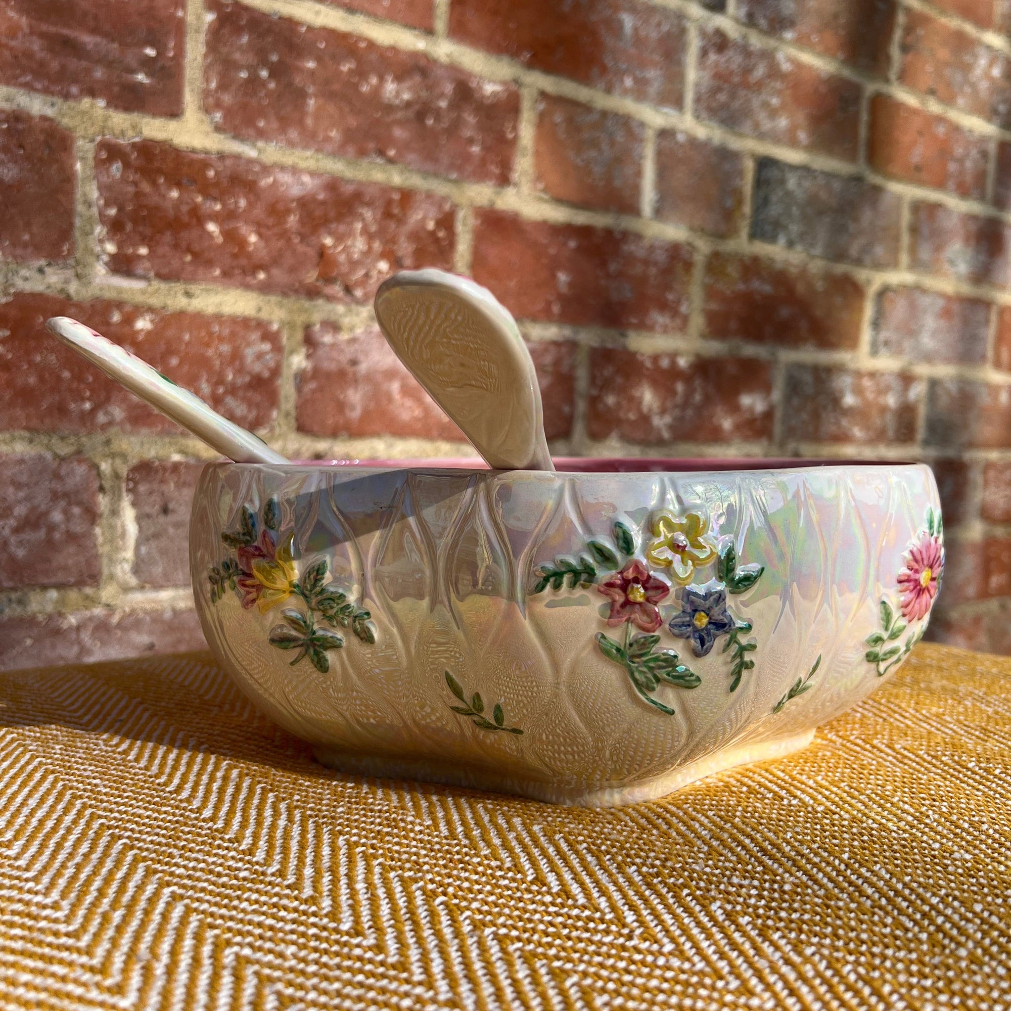 Floral salad bowl, with serving utensils