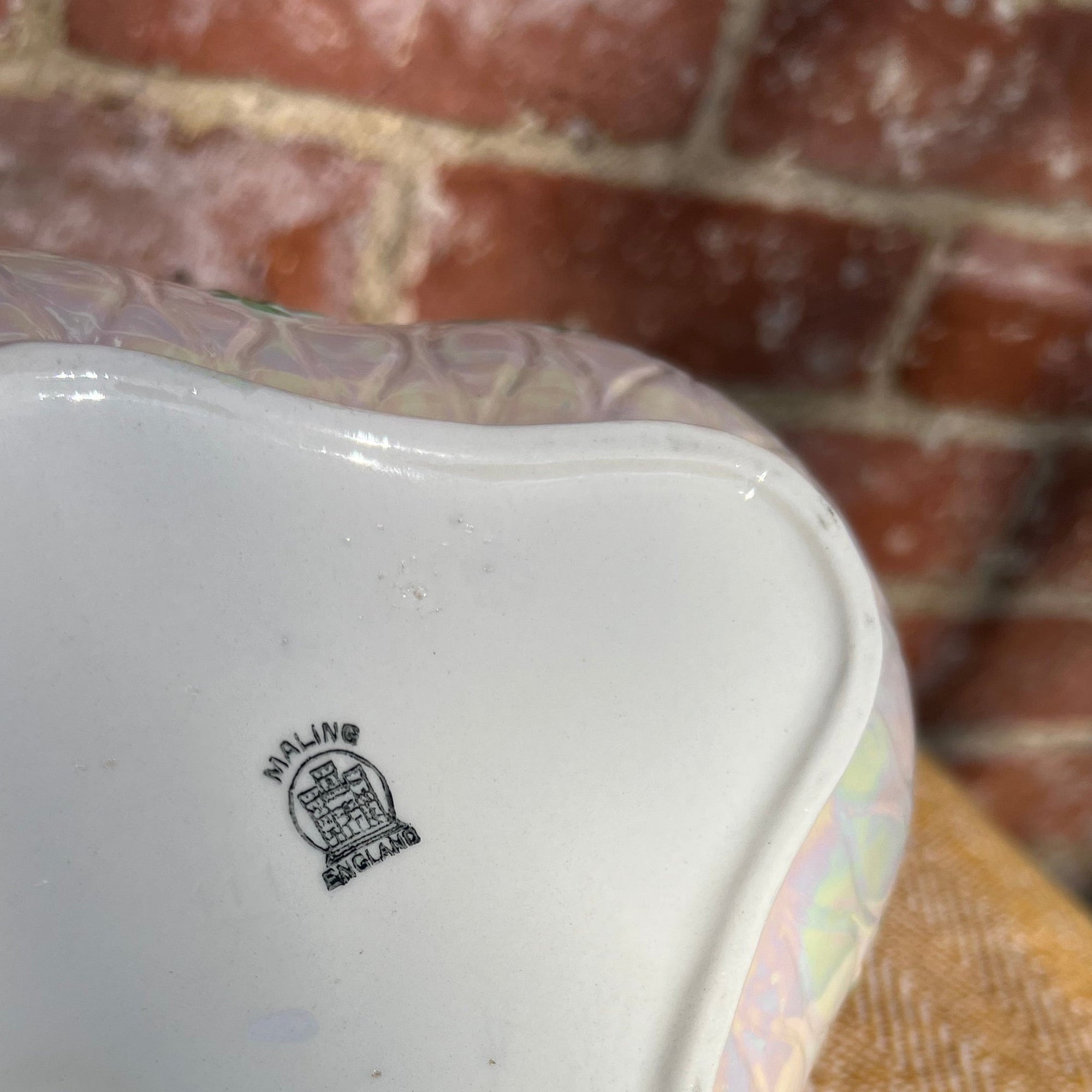 Floral salad bowl, with serving utensils