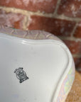 Floral salad bowl, with serving utensils