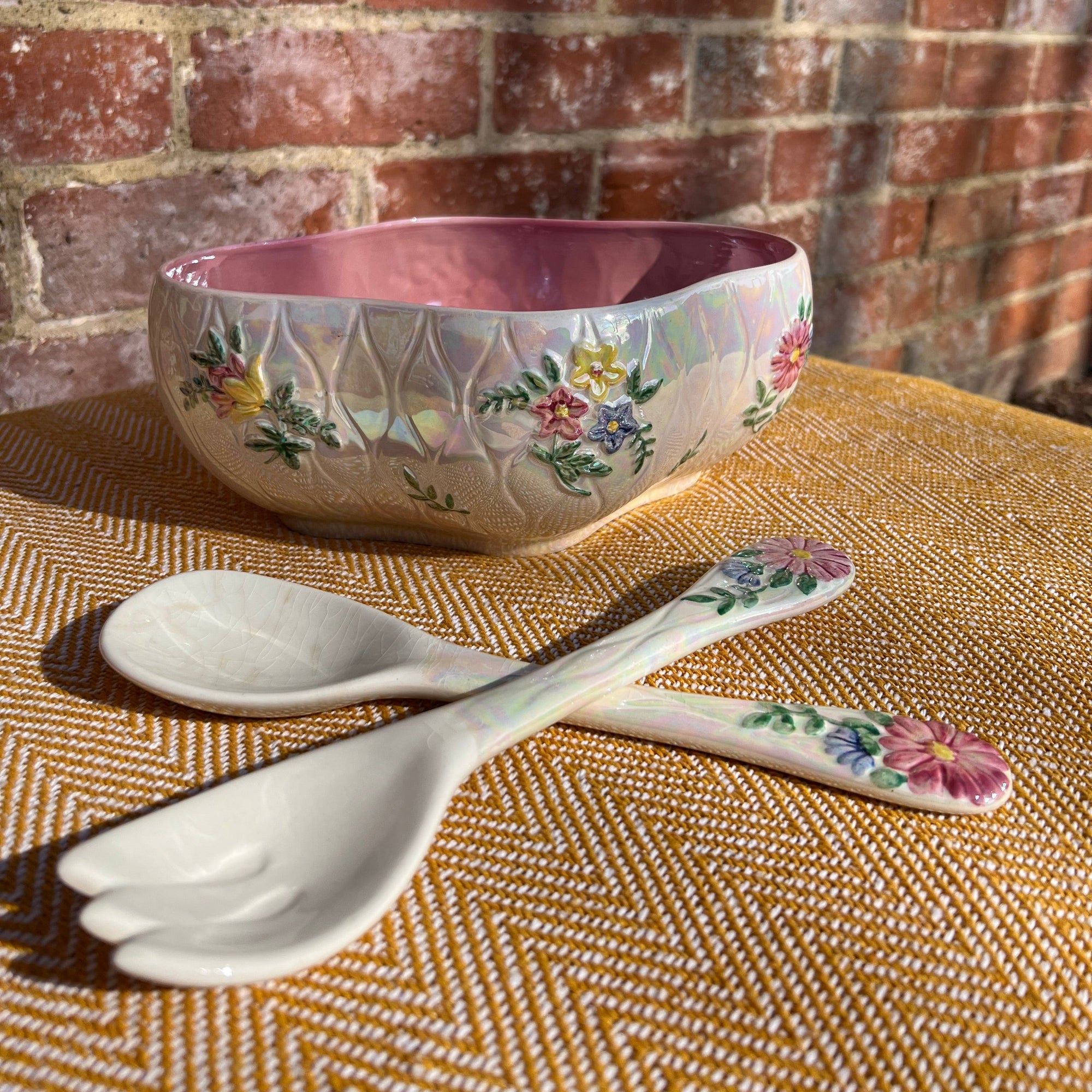 Floral salad bowl, with serving utensils