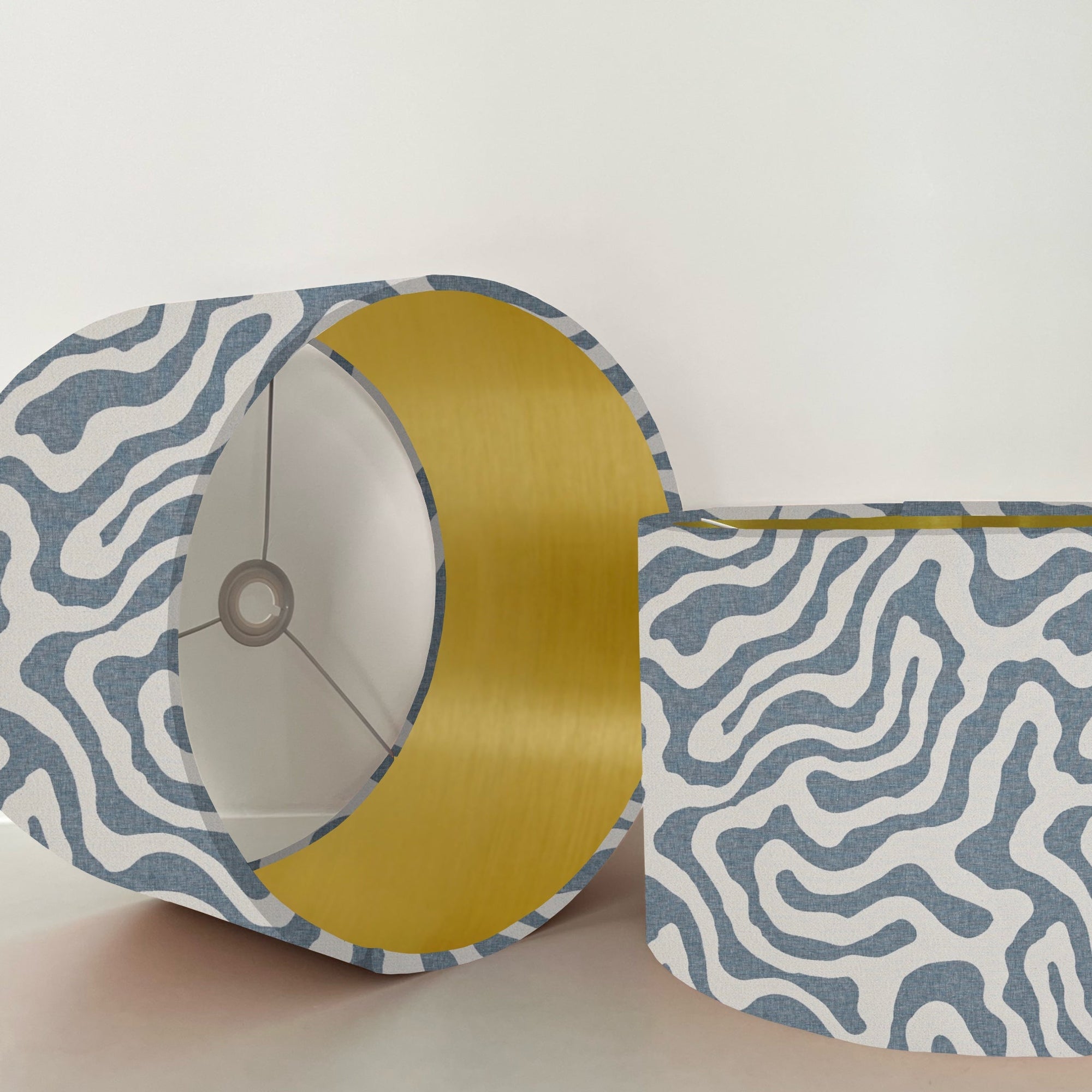 Blue wiggle drum lampshade/ ceiling shade with a metallic brushed gold lining
