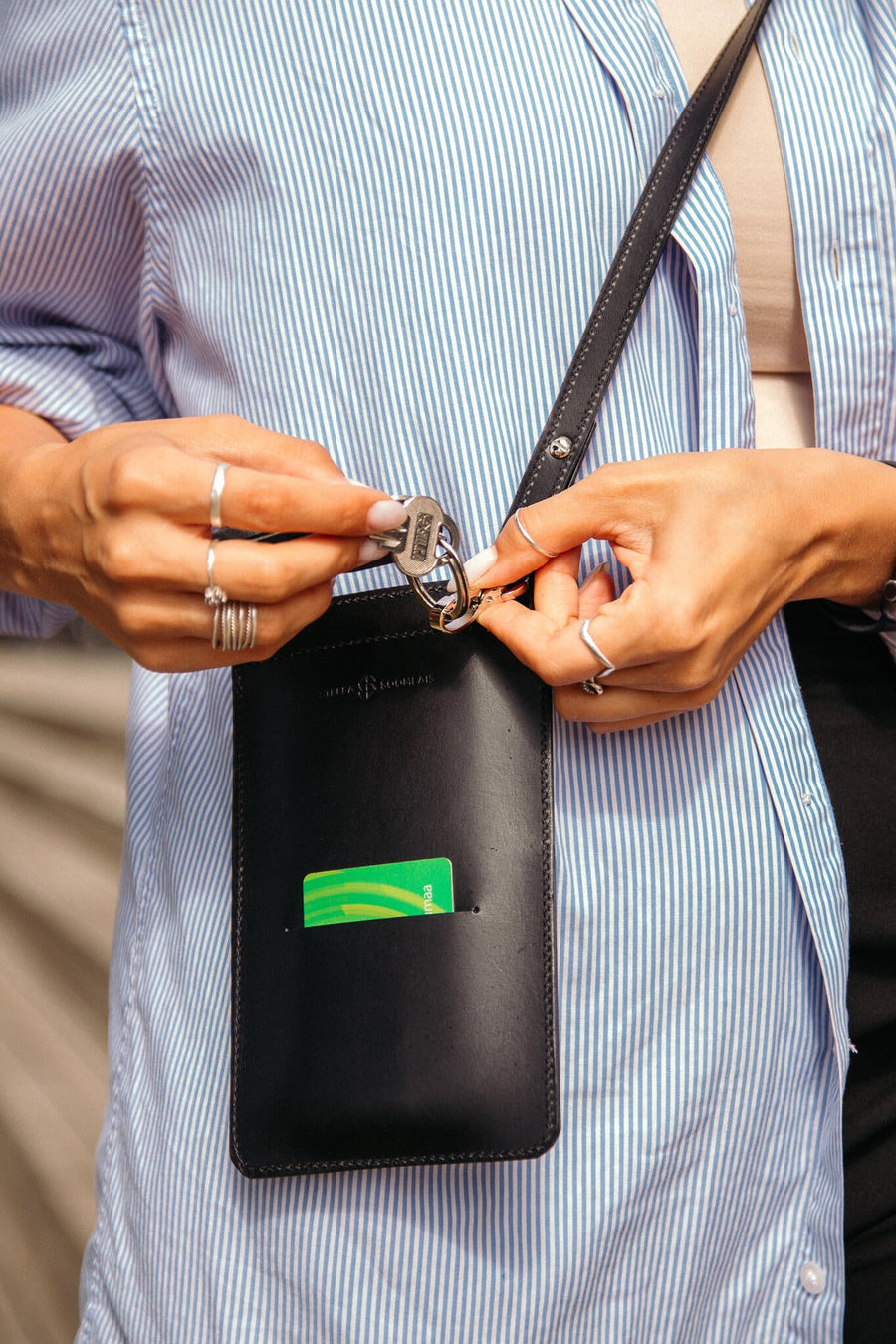 Eco-Friendly Leather Phone Bag with Strap & Closure