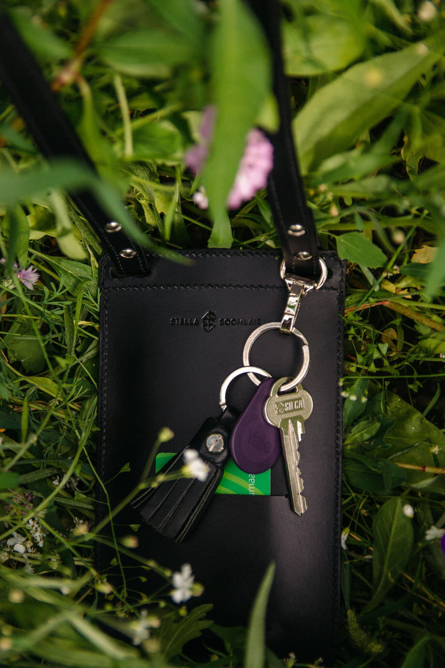 Eco-Friendly Leather Phone Bag with Strap & Closure