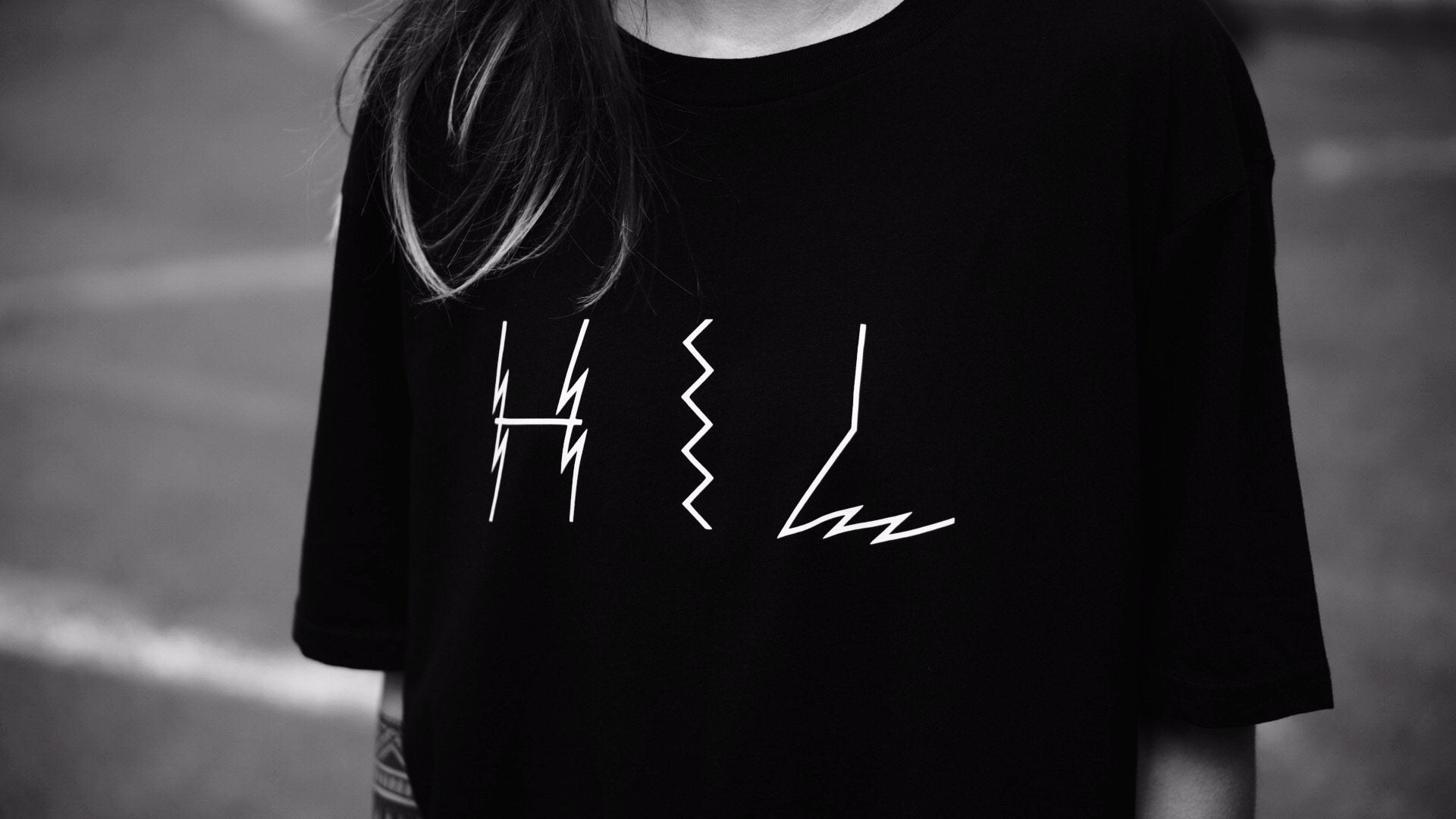 Limited edition black organic cotton tee, handprinted in Helsinki, premium unisex extra large fit, luxury sustainable design by WWOOLLFF CO. at brixbailey.com