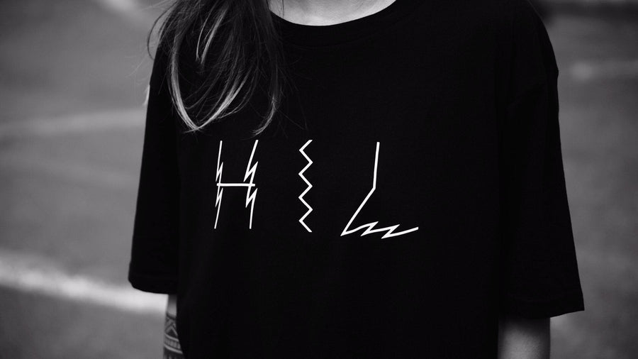 Limited edition black organic cotton tee, handprinted in Helsinki, premium unisex extra large fit, luxury sustainable design by WWOOLLFF CO. at brixbailey.com