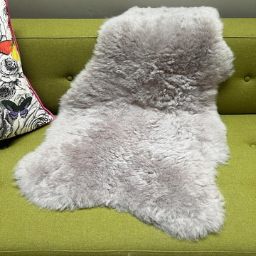 Premium Icelandic sheepskin throw in dove grey, large luxury shorn sheepskin rug, best-selling sustainable handcrafted fur by Wildash London at brixbailey.com