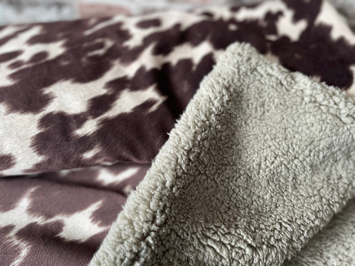 Moody Cow Reversible Pet Blanket | Faux Cowhide &amp; Sherpa | Handmade Luxury Throw for Dogs | Protects Furniture UK