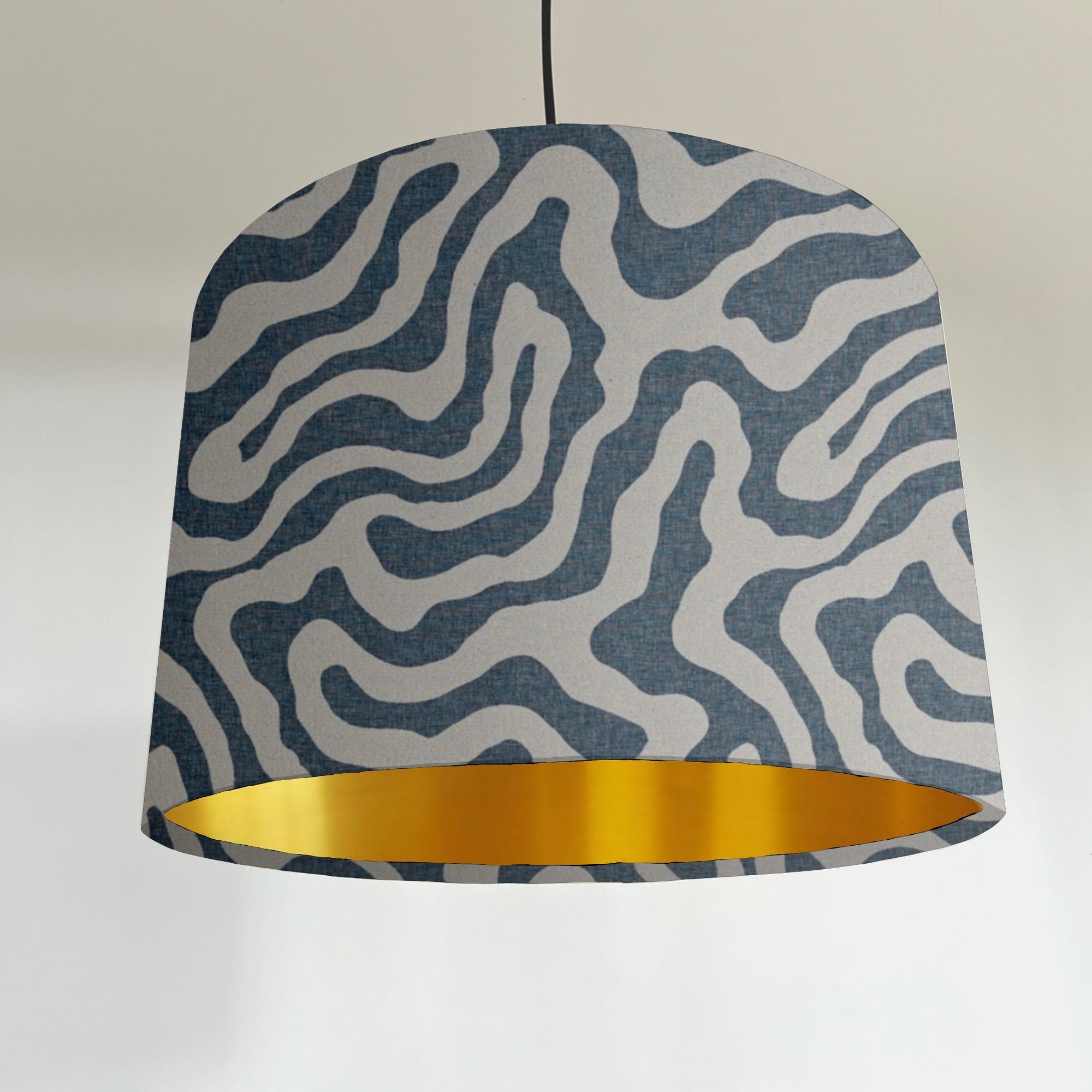Blue wiggle drum lampshade/ ceiling shade with a metallic brushed gold lining