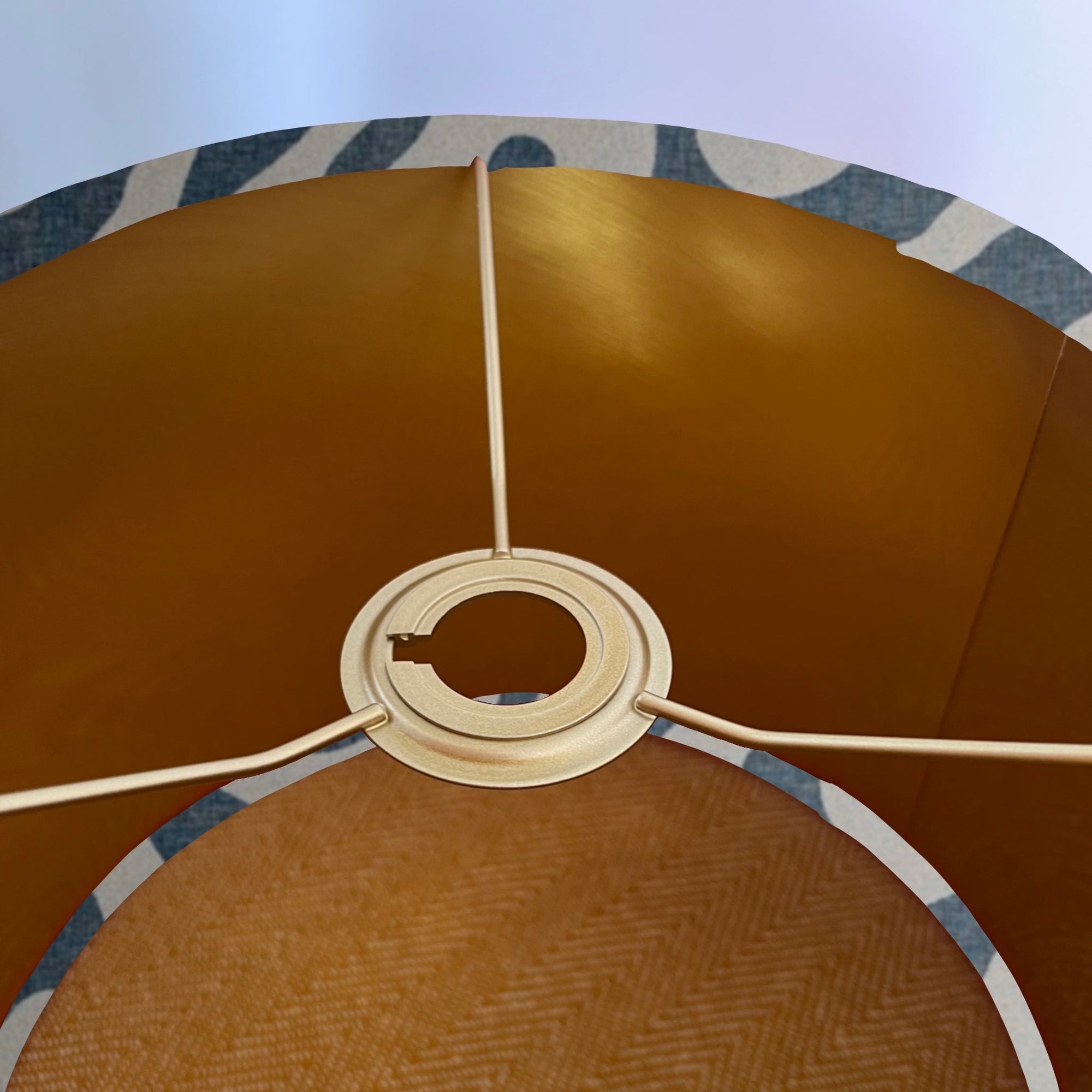 Blue wiggle drum lampshade/ ceiling shade with a metallic brushed gold lining