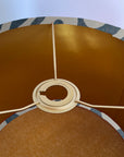 Blue wiggle drum lampshade/ ceiling shade with a metallic brushed gold lining