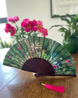 Green hand-held silk fan with 'Greenery' mushroom and crystal botanical artwork