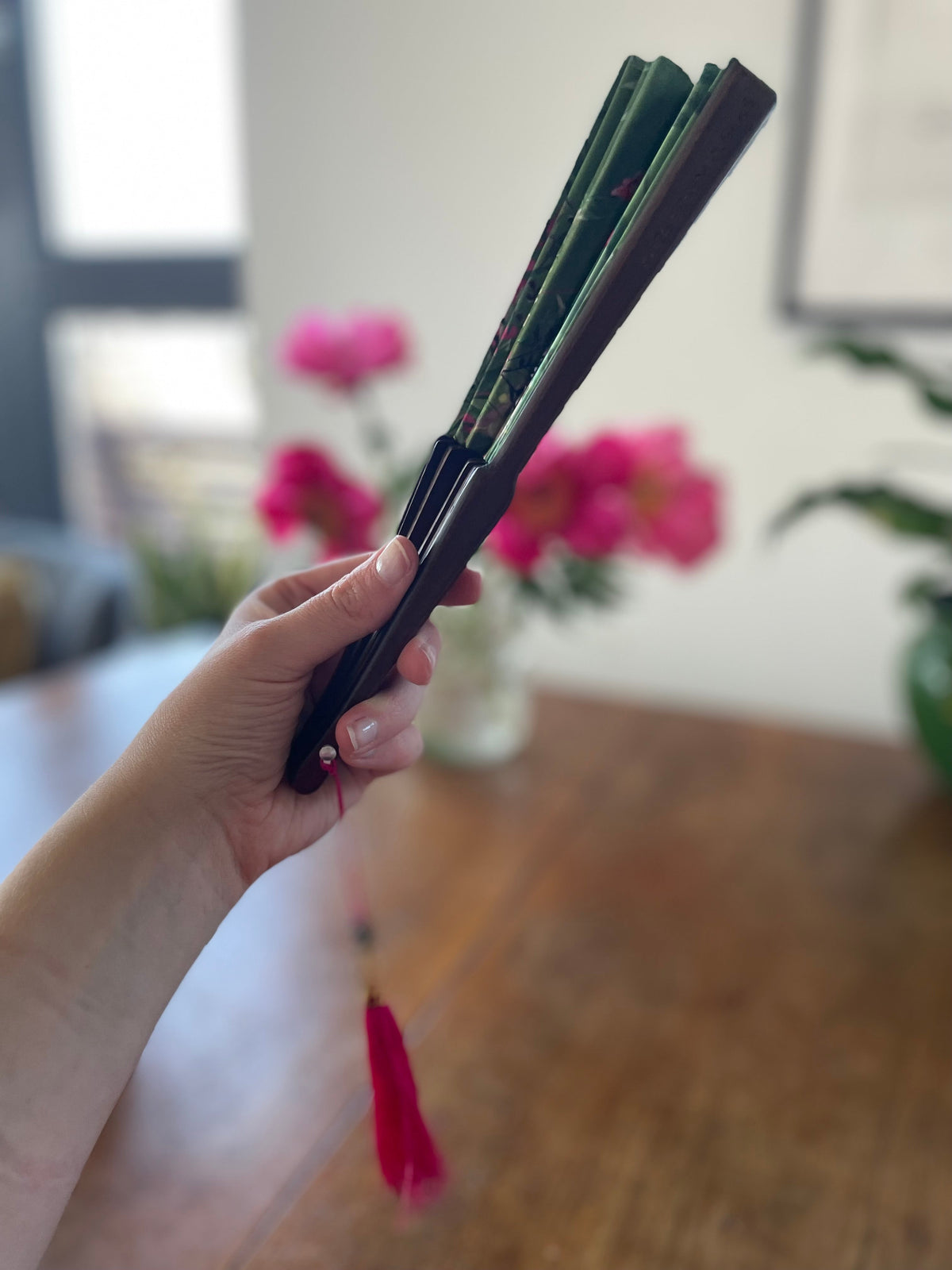 Green hand-held silk fan with 'Greenery' mushroom and crystal botanical artwork