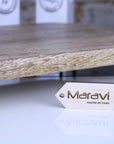 Premium Takli serving chopping board on legs, luxury mango wood charcuterie board with raised metal legs, stylish kitchen accessory by Maravi at brixbailey.com