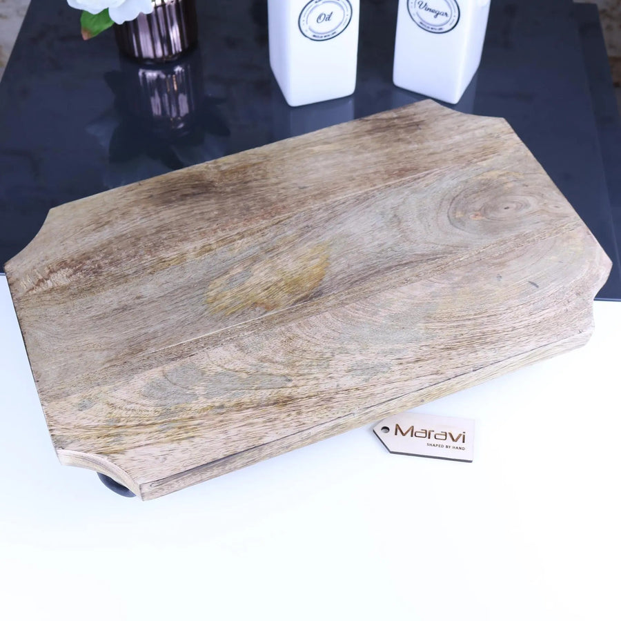 Premium Takli serving chopping board on legs, sustainable mango wood, elevated design, stylish kitchen accessory, best-selling by Maravi at brixbailey.com