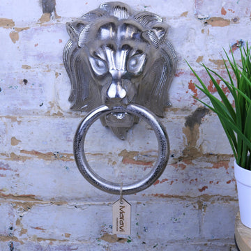 Shere metal lion head wall ornament, premium cast aluminum decorative piece, majestic regal lion design, stylish home decor statement by Maravi at brixbailey.com