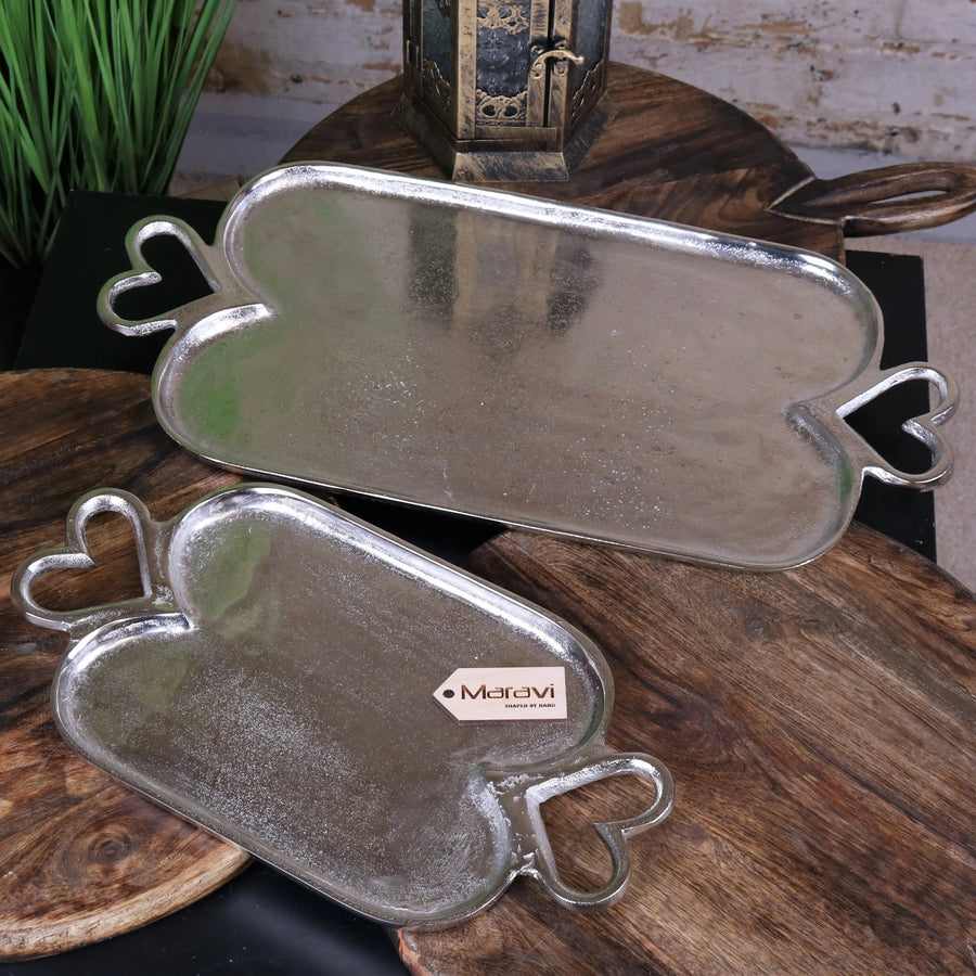Luxury heart-handle serving trays set, elegant distressed silver aluminium trays for stylish hosting, best-selling decorative serving ware by Maravi at brixbailey.com