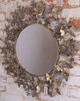 Luxury gold butterfly wall mirror, elegant antiqued finish with intricate butterfly design, stylish decorative accent piece for living room or bedroom by Maravi at brixbailey.com