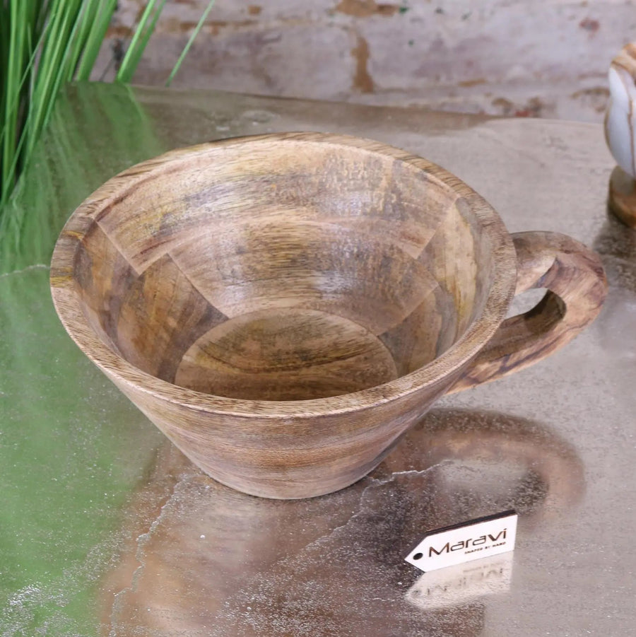 Luxury handcrafted mango wood bowl with handle, stylish rustic kitchen decor, unique mug-shaped wooden serving bowl, eco-friendly best-selling home accessory by Maravi at brixbailey.com
