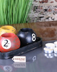Luxury vintage 8 ball candle holders set, handcrafted resin billiard ball tealight holders with distressed detailing and black tray by Maravi at brixbailey.com