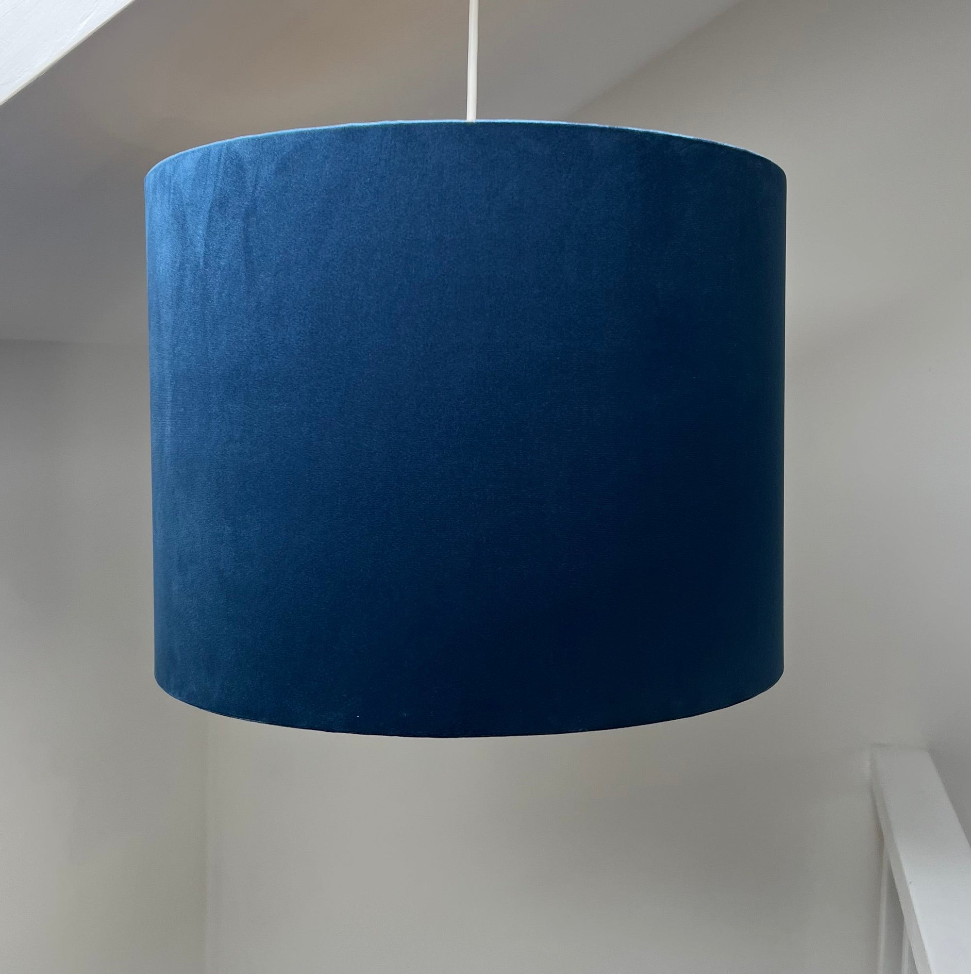 Navy velvet drum lampshade/ ceiling shade with a metallic brushed gold lining