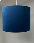 Navy velvet drum lampshade/ ceiling shade with a metallic brushed gold lining
