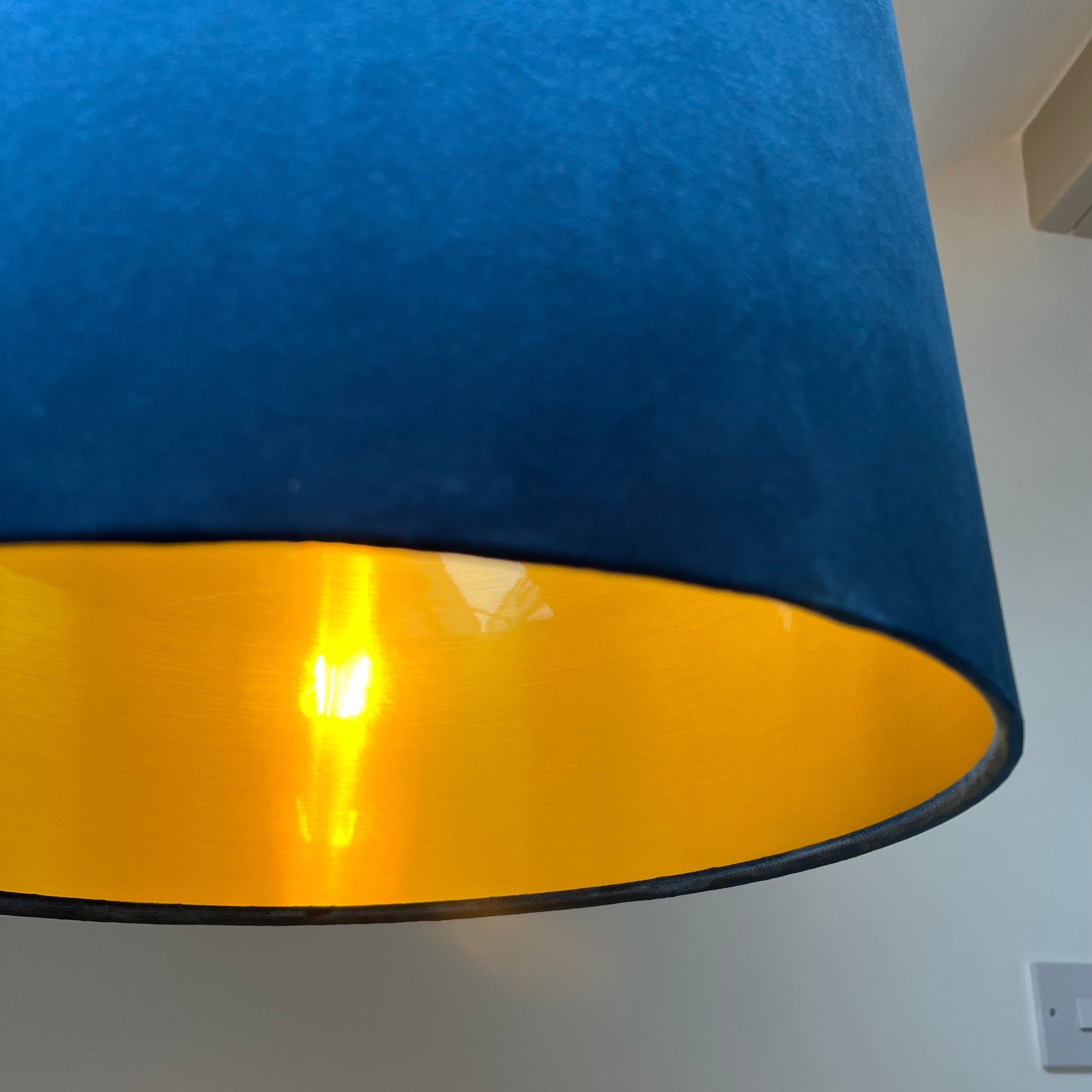 Navy velvet drum lampshade/ ceiling shade with a metallic brushed gold lining