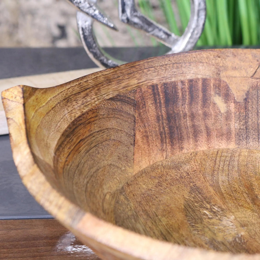Luxury large wooden fruit bowl, handcrafted mango wood with unique three-point design, stylish rustic kitchen decor, best-selling serving bowl by Maravi at brixbailey.com