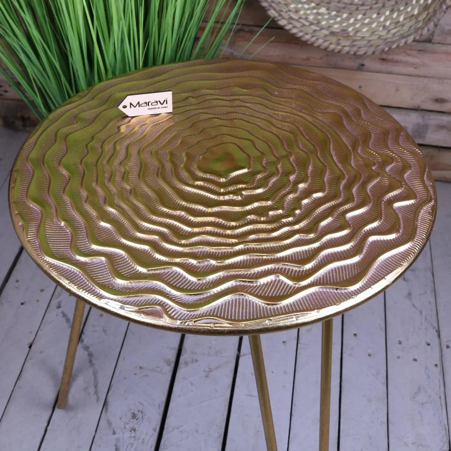 Luxury gold tripod side table, elegant Malan design with circular patterned top, stylish and practical for living room or bedroom by Maravi at brixbailey.com
