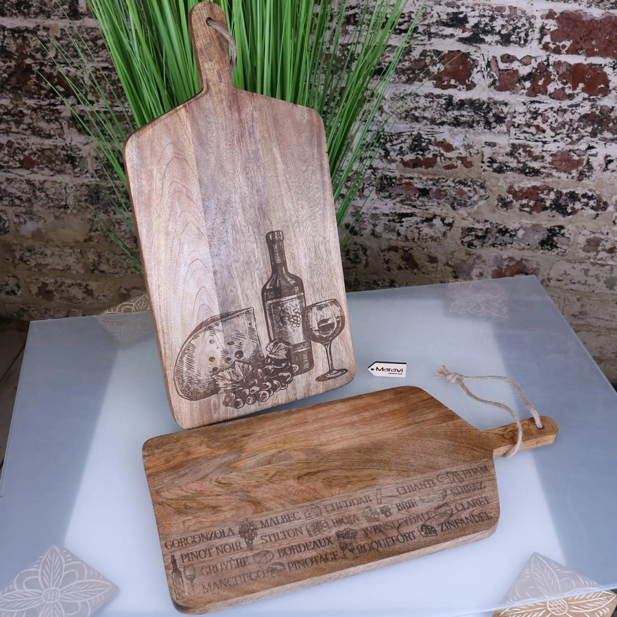 Premium wooden serving board with cheese and wine laser engraving, stylish mango wood charcuterie board for elegant dining by Maravi at brixbailey.com