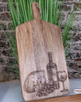 Luxury wooden serving board, elegant cheese and wine theme, handcrafted mango wood, stylish dining accessory, best-selling kitchen gift by Maravi at brixbailey.com