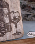 Premium wooden serving board with cheese and wine laser engraving, elegant mango wood charcuterie board for stylish dining by Maravi at brixbailey.com