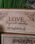 Noakh Live Laugh Love wooden storage boxes with lids, premium mango wood hinged lid set, stylish rustic home decor, best-selling inspirational gift by Maravi at brixbailey.com