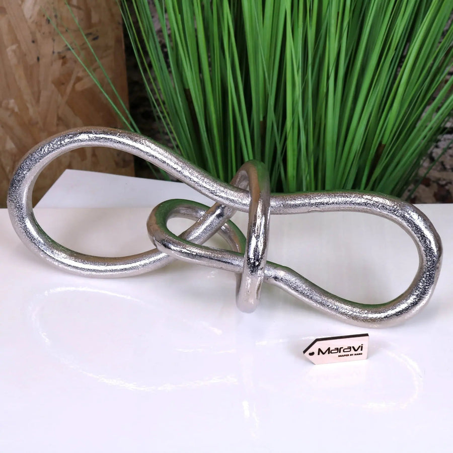 Luxury distressed silver aluminum knot sculpture, premium modern abstract art decor for home or office by Maravi at brixbailey.com